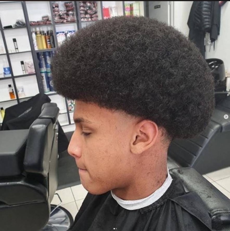 Afro shape-up and taper at Saba Barbershop